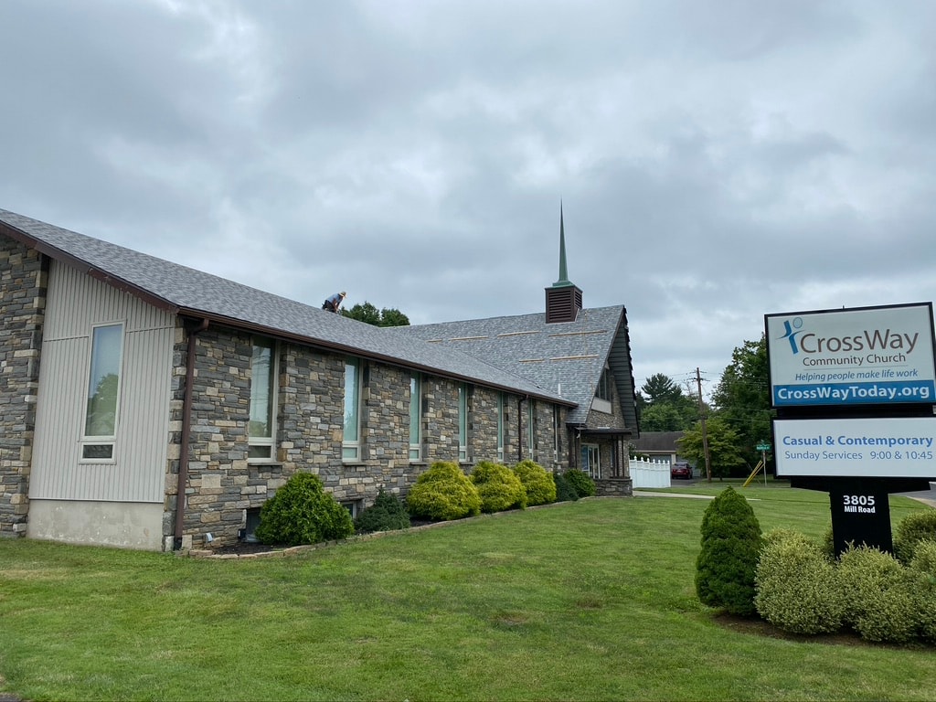 Completed new roof on stone facade wing of Crossway Community Church