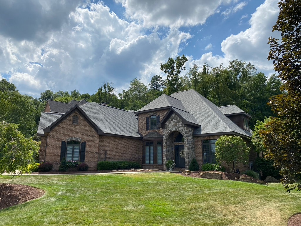 Completed Owens Corning Duration Estate Grey roof on luxury Pittsburgh brick home front